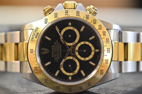 rolex daytona acciaio e oro senza numeri quadrante nero|Rolex Cosmograph Daytona in Oro, M126519LN.